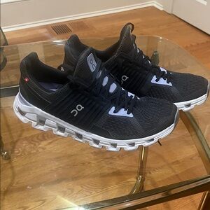 On Running Charcoal and White Athletic Shoes